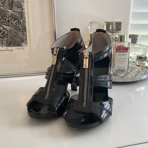 Michael Kors Black Patent Leather T-Strap Zip Heels